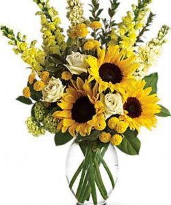 Here comes the sun...and a whole lotta lovely flowers! This large bouquet of mixed yellow flowers is a sunny way to say,