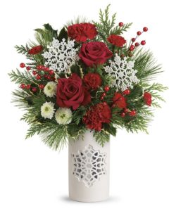 a fresh, festive rose bouquet, arranged in this snow white porcelain vase with punched snowflake on both sides.