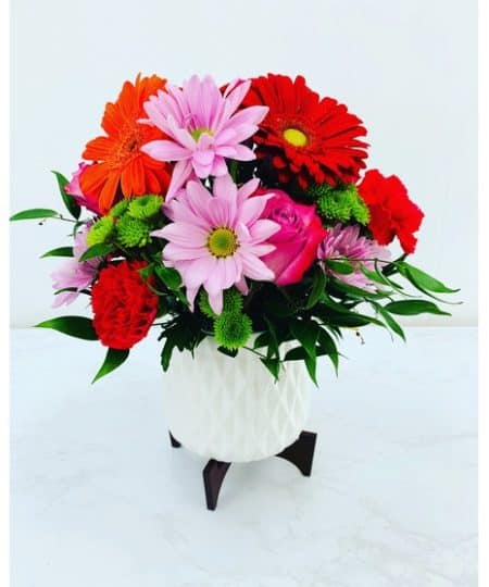 Two gorgeous gifts in one! Celebrate any occasion with this bouquet of bright blooms, stylishly presented in a mod mid-century ceramic planter keepsake!