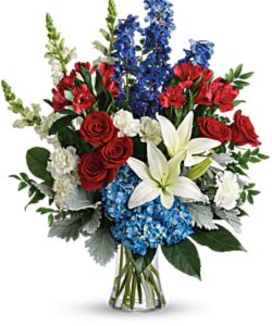 A colorful tribute for someone special, this brilliant bouquet of red, white and blue blooms is both perfectly patriotic and gorgeous.