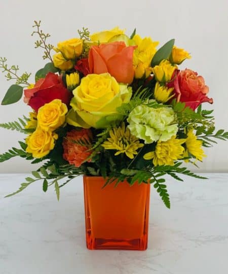 Bold oranges, greens, and yellows designed in this bright cube are the perfect blend of citrus colors! 